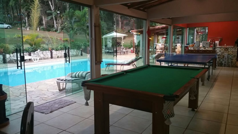 área gourmet com sala de jogos integrada