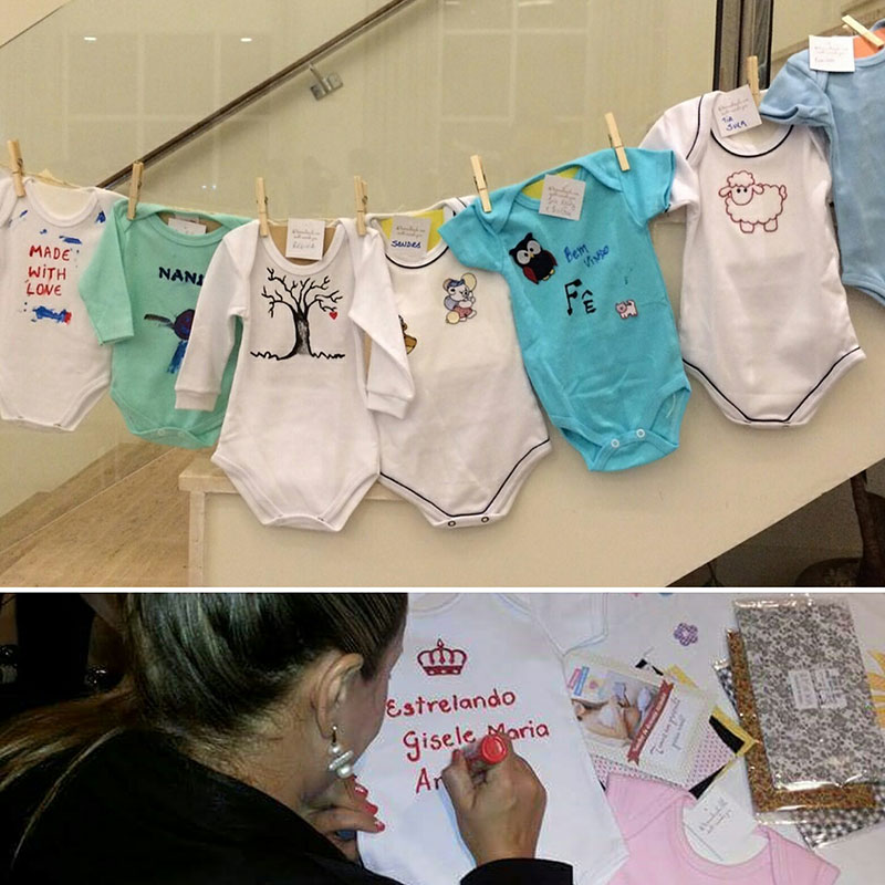 decoração cha de bebe com roupinhas