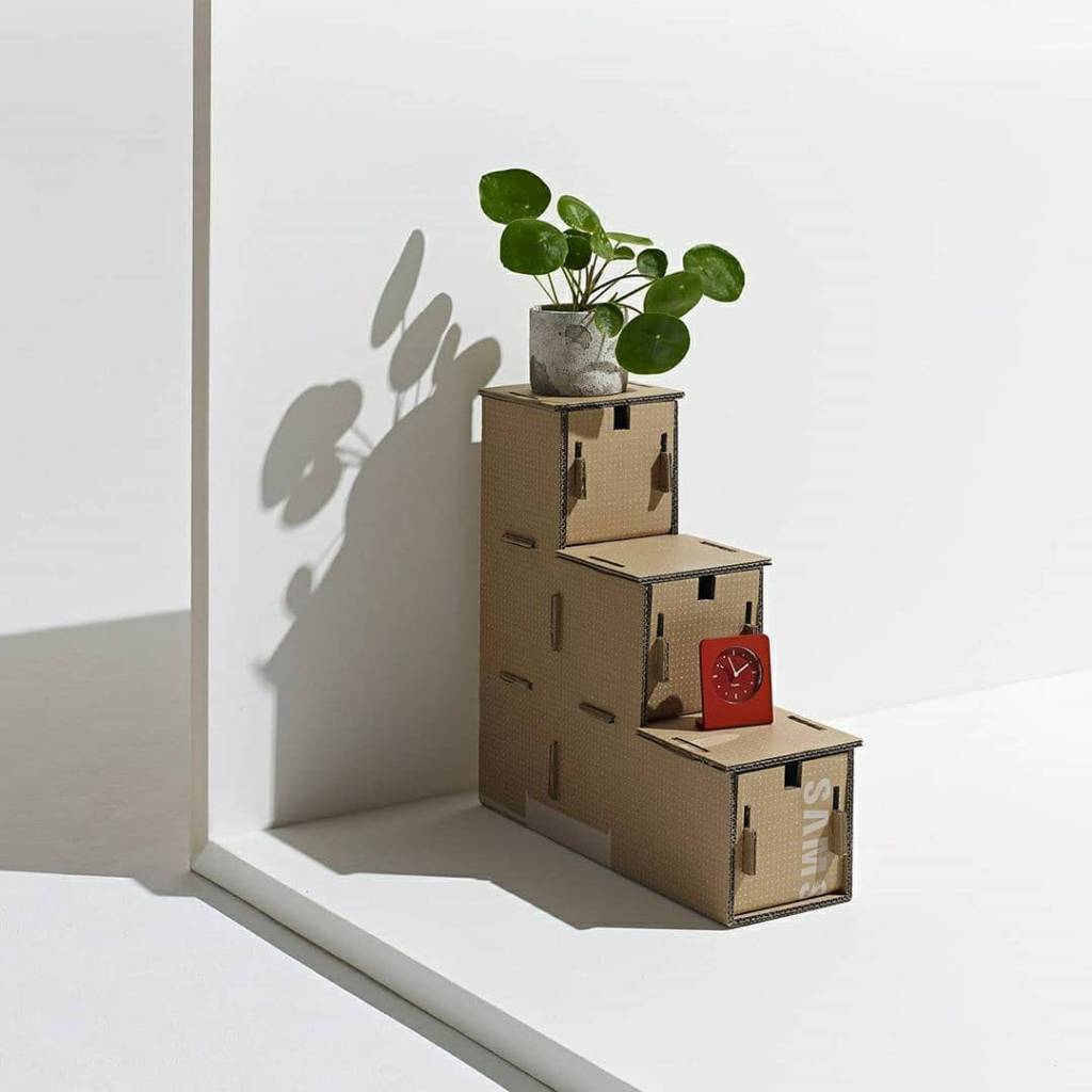 caixa papelão vs outros materiais decoração sustentável