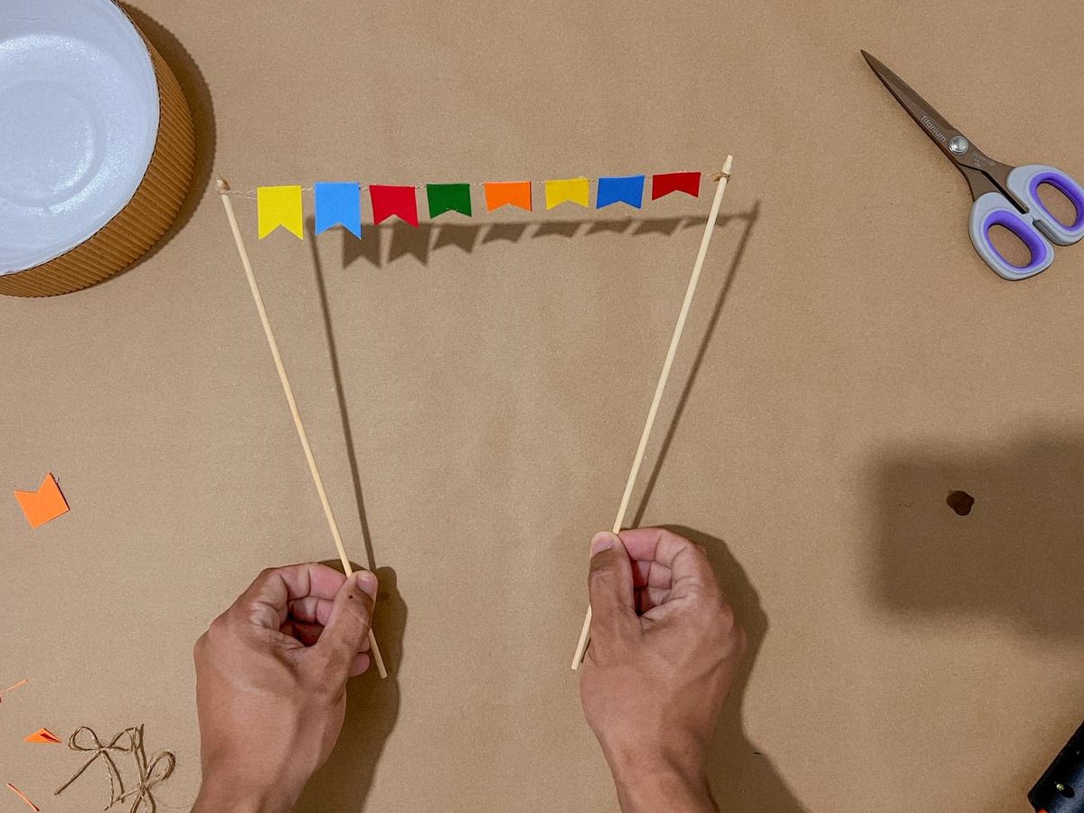 bandeirolas de tecido vs papel qual a melhor opção