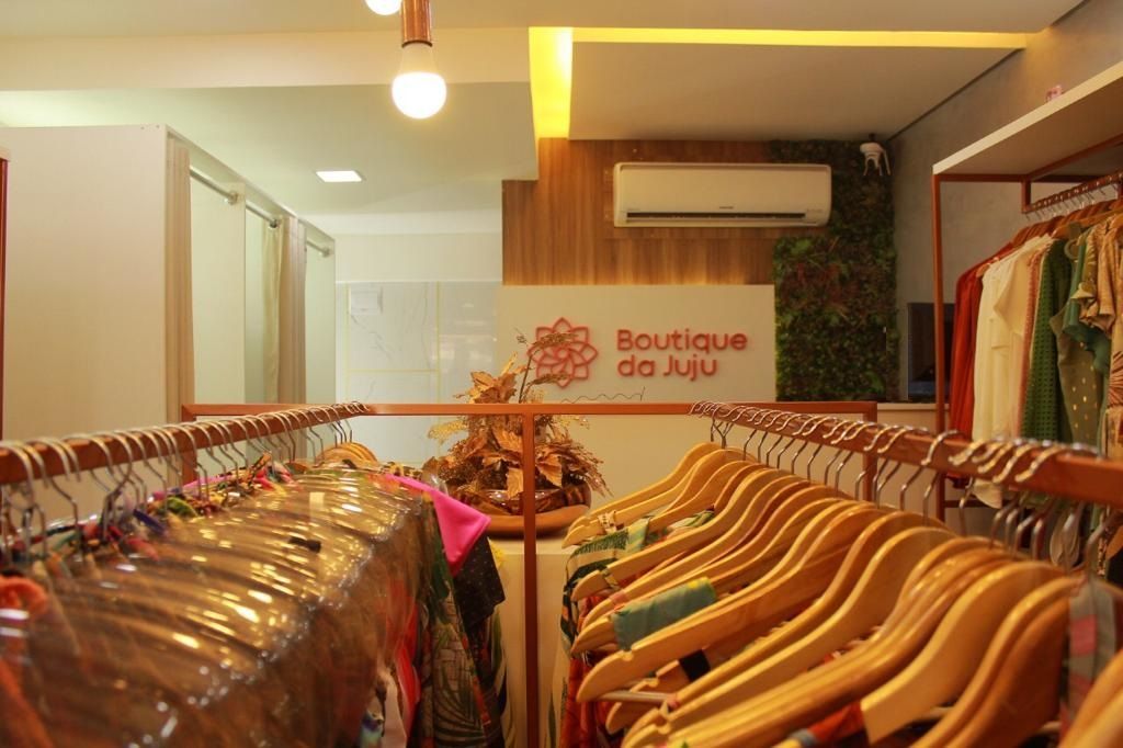 decoracao de loja de roupas feminina