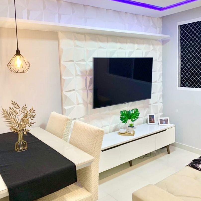 decoração de sala pequena com mesa de jantar e sofá