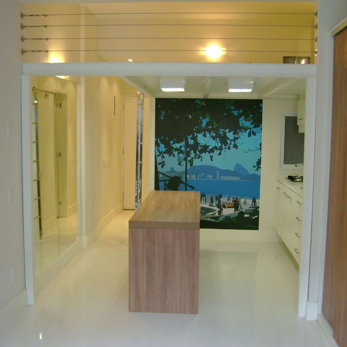 como otimizar espaço em kitnet 25m2 com móveis planejados