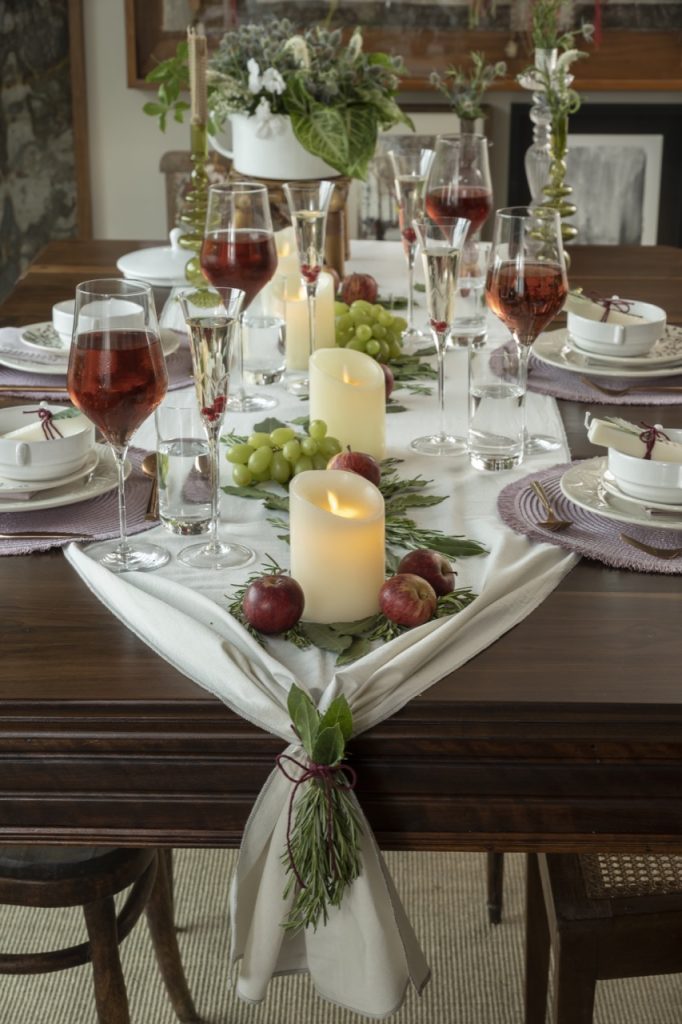 centro de mesa reveillon com frutas e velas
