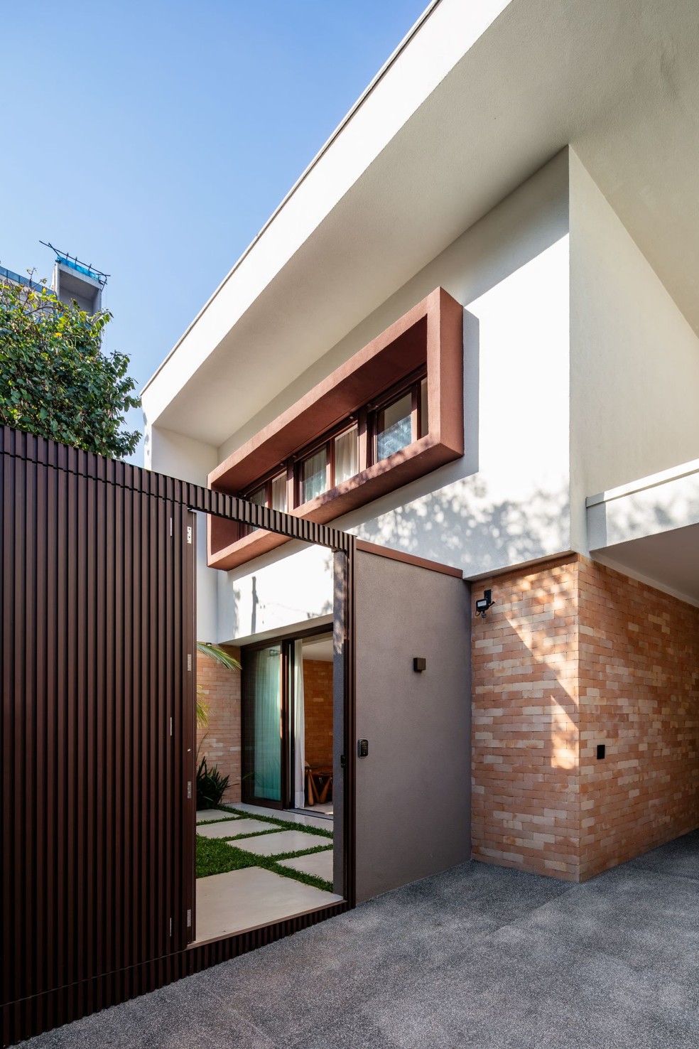 fachada de muro com portão privativo