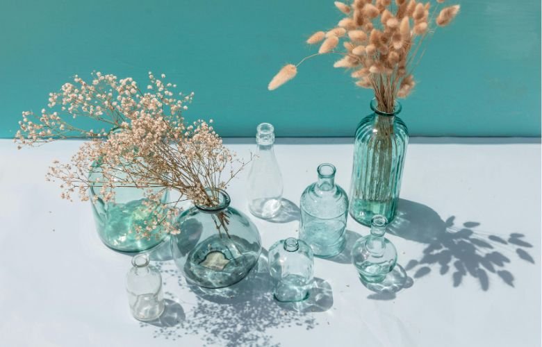 ideias criativas garrafas de vidro para decorar