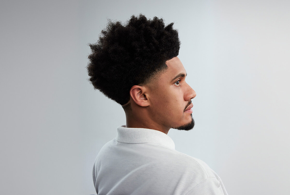 listra em v no corte americano