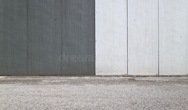 Muro cinza com iluminação