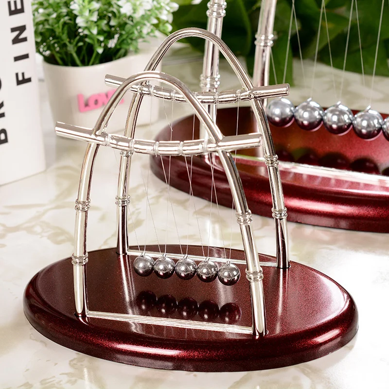 erros comuns ao comprar pendulo de newton