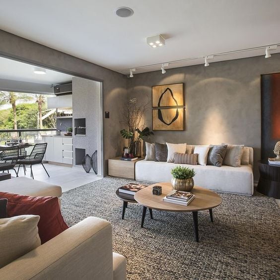 Tendências de Decoração 2026: Sofás Grandes e Formas Arredondadas para Ambientes Integrados