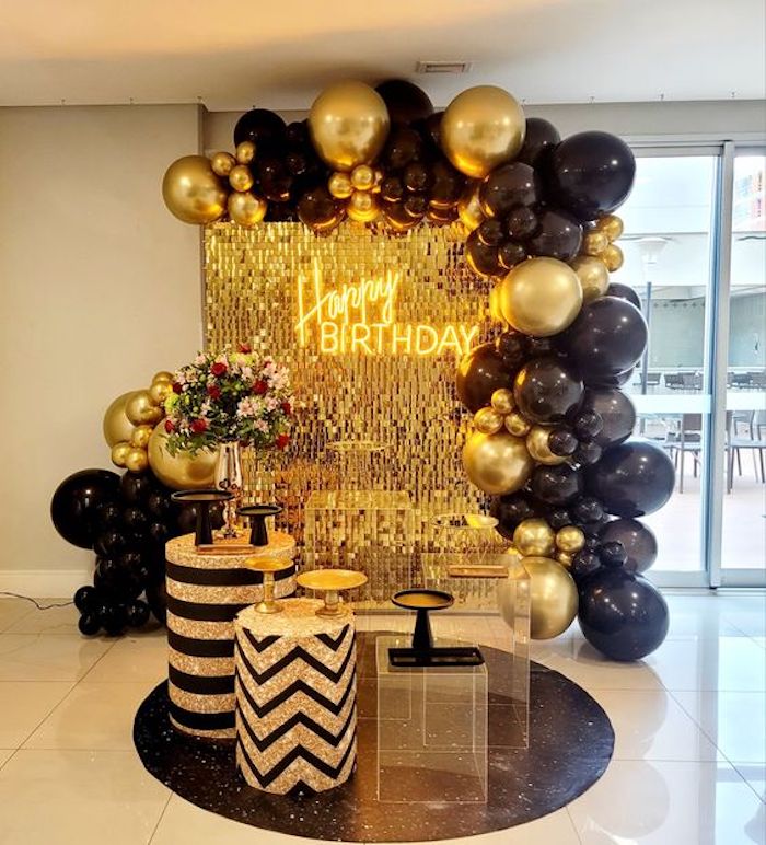 preto e dourado para sala