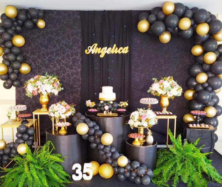 decoração de festa preto e dourado